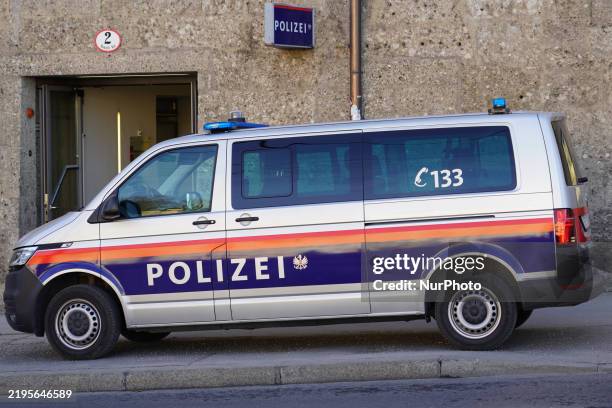 Police car is in front of a police station in Salzburg, Austria, on January 25, 2025.