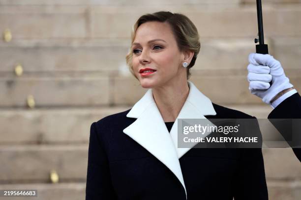 Princess Charlene of Monaco leaves the cathedral after taking part in the traditional festivities of Sainte Devote in the Principalty of Monaco on...