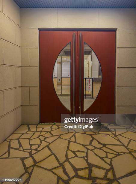entrance to a modern apartment building at night - fenestra of vestibule stock pictures, royalty-free photos & images