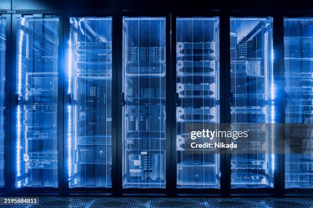 high-tech data center with server racks - supercomputer stock pictures, royalty-free photos & images