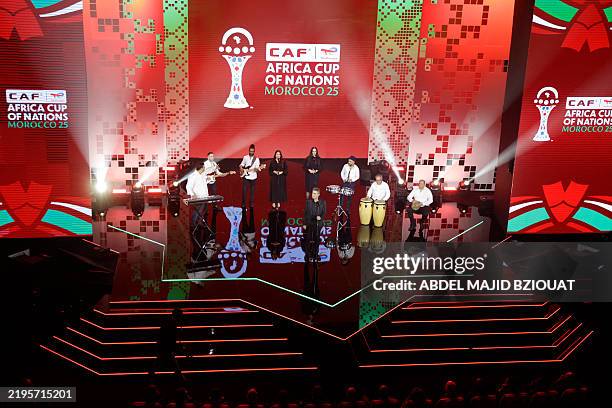 Musicians perform on stage during the draw of the CAF 2025 AFCON Africa Cup of Nations football tournament, in Rabat, on January 27, 2025.