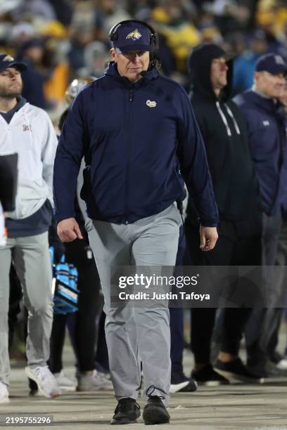Head coach Brent Vigen of the Montana State Bobcats coaches from the sideline during the first half of the Division I FCS Football Championship game...