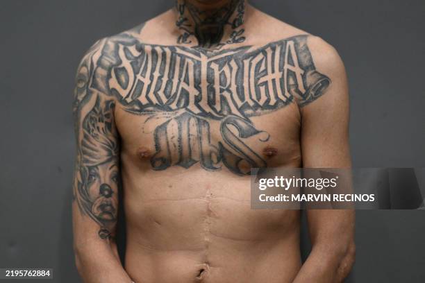 Mara Salvatrucha gang member sentenced to more than 200 years in prison shows off his tattoos alluding to his gang inside the Counter-Terrorism...