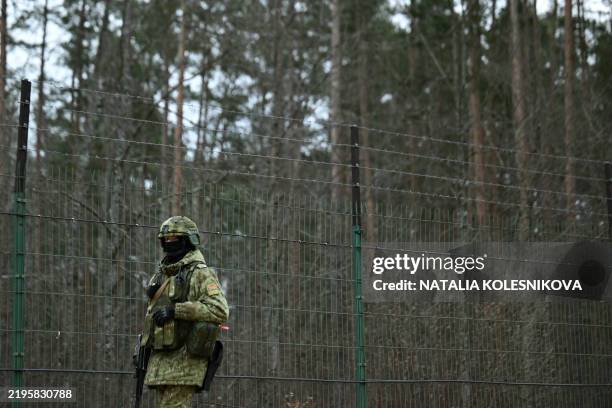 Belarusian border guard patrols along the border between Belarus and Ukraine on January 28, 2025.