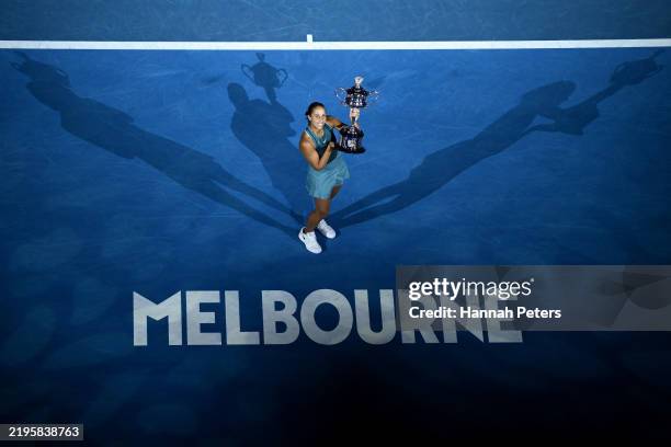 Madison Keys of the United States poses with the Daphne Akhurst Memorial Cup after the Women's Singles Trophy Presentation following the Women's...