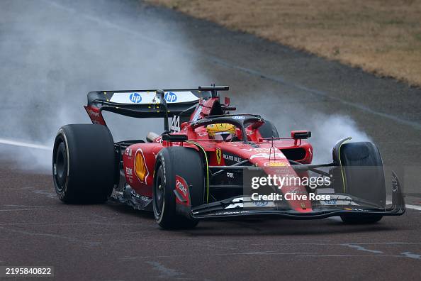 Lewis Hamilton Of Great Britain Driving The Ferrari SF 23 Locks A lewis-hamilton-of-great-britain-driving-the-ferrari-sf-23-locks-a