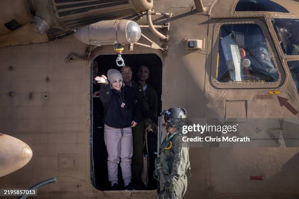 Hostage, Daniella Gilboa waves from the door of the helicopter after arriving at Belinson-Schneider Hospital on January 25, 2025 in Tel Aviv, Israel....