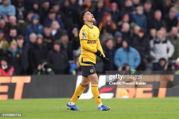 Joao Gomes of Wolverhampton Wanderers reacts whilst leaving the pitch after being shown a red card following a second yellow card during the Premier...