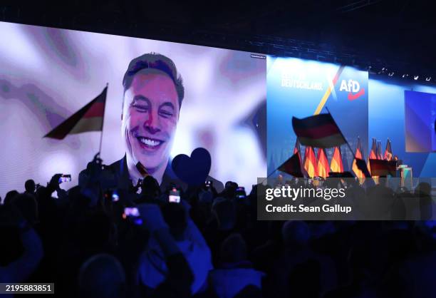 Tech billionaire Elon Musk speaks live via a video transmission during a speech by Alice Weidel, chancellor candidate of the far-right Alternative...