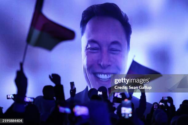Tech billionaire Elon Musk speaks live via a video transmission during the election campaign launch rally of the far-right Alternative for Germany...