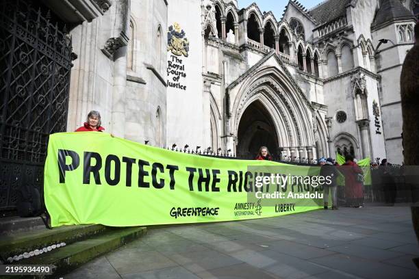 Supporters of Just Stop Oil activists, who appeared in court for different actions, including spilling tomato soup on Vincent Van Gogh's "Sunflowers"...