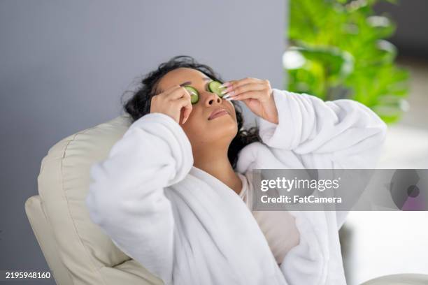 facial time - bathrobe stock pictures, royalty-free photos & images