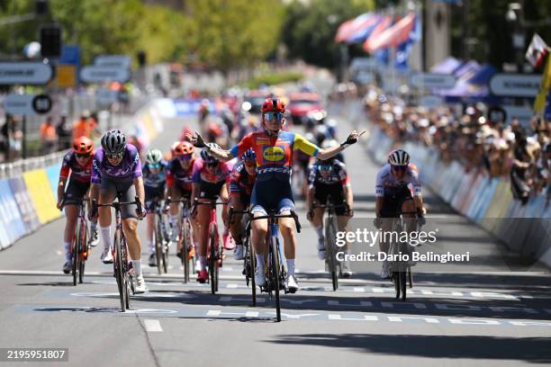 Clara Copponi of France and Team Lidl - Trek celebrates at finish line as race winner ahead of Georgia Baker of Australia and Team Liv Alula Jayco...