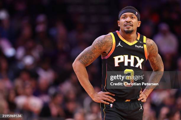 Bradley Beal of the Phoenix Suns looks on during the second half of the NBA game against the Washington Wizards at Footprint Center on January 25,...
