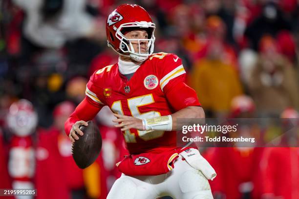 Quarterback Patrick Mahomes of the Kansas City Chiefs drops back to pass during the first half of the AFC Championship game against the Buffalo...