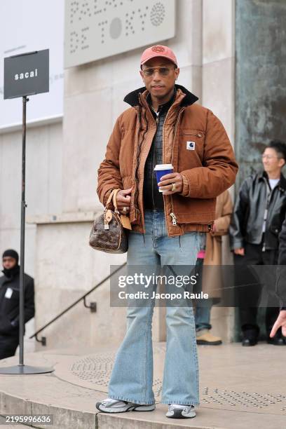 Pharrell Williams attends the Sacai Menswear Fall-Winter 2025/2026 show as part of Paris Fashion Week on January 26, 2025 in Paris, France.