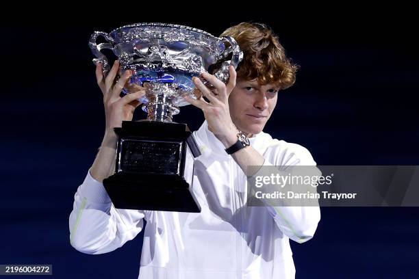 Jannik Sinner of Italy is presented the Norman Brookes Challenge Cup at the Men's Singles trophy presentation following the Men's Singles final...