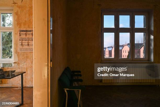 View of the former Nazi German Auschwitz I Concentration Death Camp from one of the rooms of the House 88, the former residence of Auschwitz...