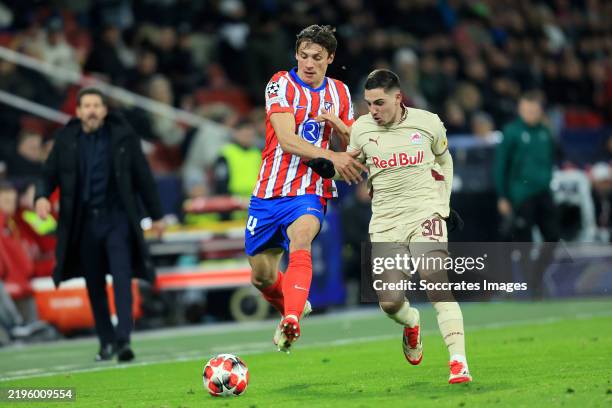 Robin Le Normand of Atletico Madrid, Oscar Gloukh of FC Salzburg during the UEFA Champions League match between Salzburg v Atletico Madrid at the Red...