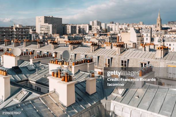 paris rooftops, buildings and chimney - chimney roof stock pictures, royalty-free photos & images