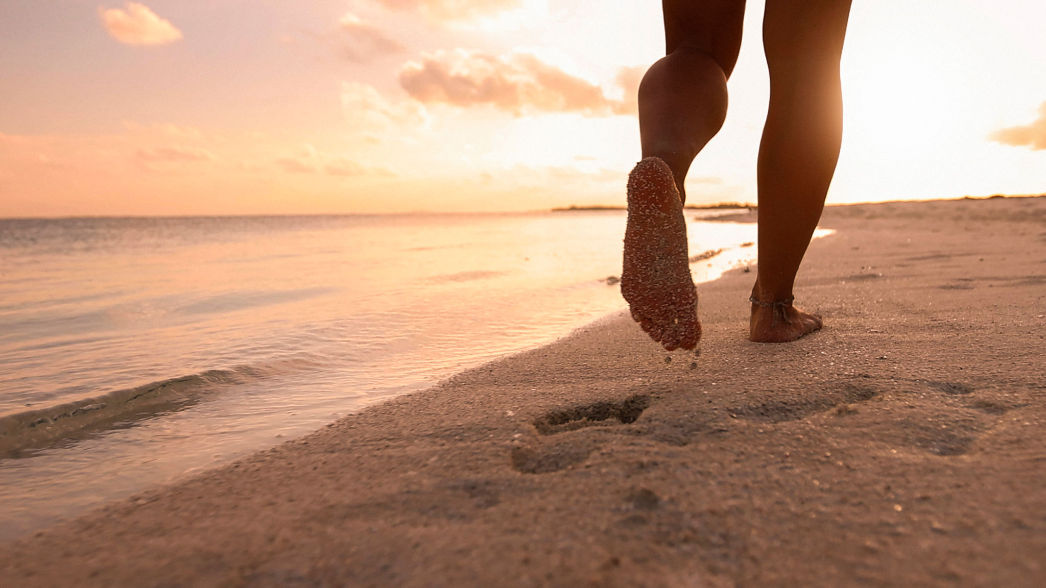Grounding therapy at the beach Grounding therapy at the beach