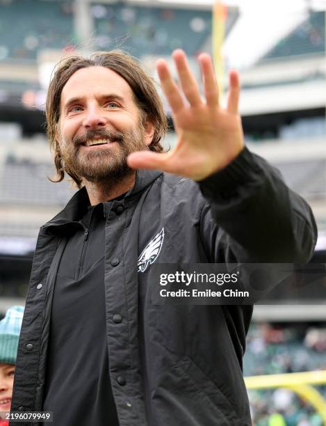 Actor Bradley Cooper walks on the sidelines prior to the NFC Championship Game between the Washington Commanders and the Philadelphia Eagles at...