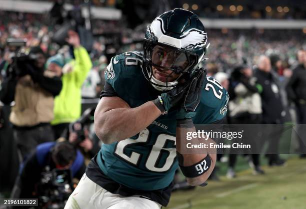 Saquon Barkley of the Philadelphia Eagles reacts to his touchdown against the Washington Commanders during the fourth quarter in the NFC Championship...