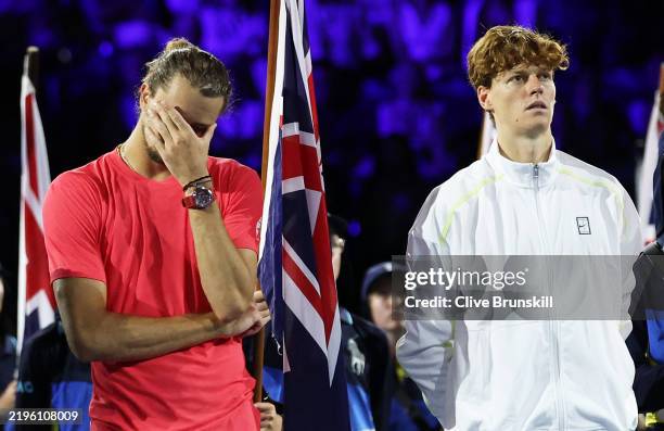 Winner Jannik Sinner of Italy and runner-up Alexander Zverev of Germany shows his emotion as they wait for the Men's Singles trophy presentation...