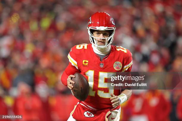 Patrick Mahomes of the Kansas City Chiefs runs the ball for a touchdown during the second quarter against the Buffalo Bills in the AFC Championship...
