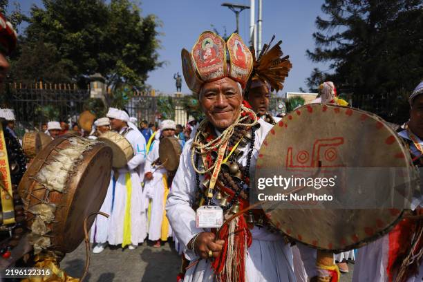 Nepali Shaman beats a drum as he parades in Kathmandu, Nepal, on January 30 during the New Year of the Indigenous Tamang community, the Sonam Lhosar....