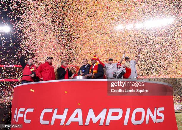 Head coach Andy Reid, owner Clark Hunt, Patrick Mahomes, and Travis Kelce of the Kansas City Chiefs celebrate after defeating the Buffalo Bills 32-29...