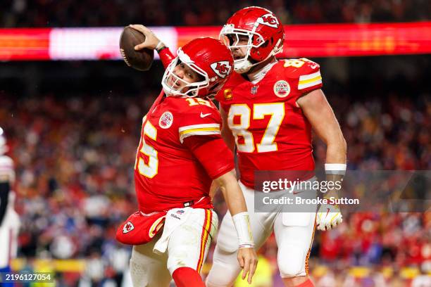 Quarterback Patrick Mahomes of the Kansas City Chiefs celebrates with tight end Travis Kelce after a touchdown during the second half of the AFC...