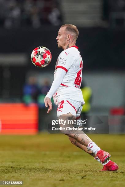 David Raum of RB Leipzig controls the ball during the UEFA Champions League 2024/25 League Phase MD8 match between SK Sturm Graz and RB Leipzig at...