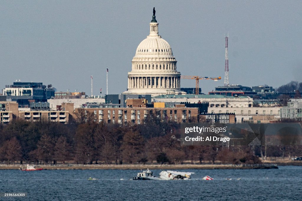 American Airlines Plane And Black Hawk Helicopter Crash Near Reagan National Airport