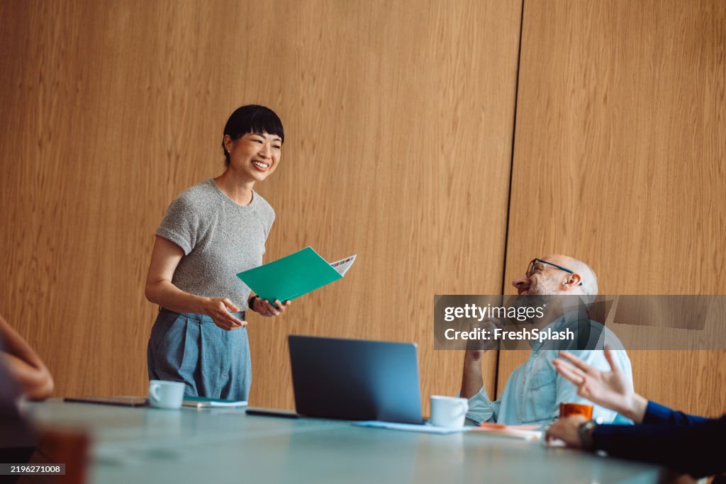 Smiling Professional Meeting in Modern Office with Positive Interaction and Team Collaboration