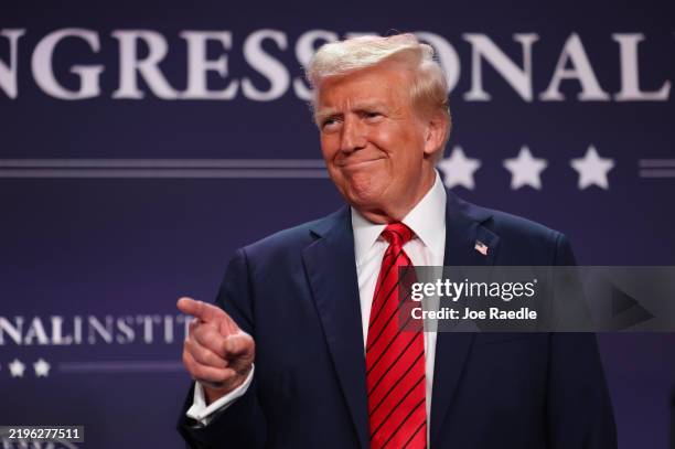 President Donald Trump acknowledges the crowd before addressing the 2025 Republican Issues Conference at the Trump National Doral Miami on January...