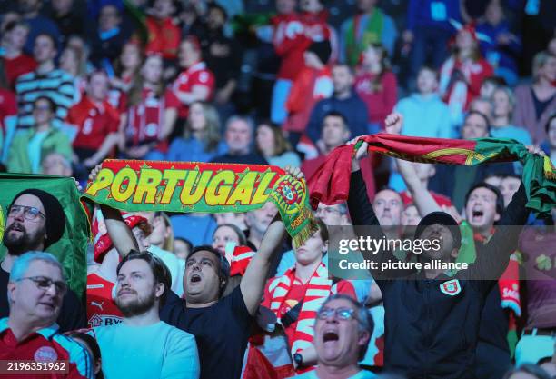 January 2025, Norway, Oslo: Handball: World Championship, Denmark - Portugal, final round, semi-final, Unity Arena, Portuguese fans sing the national...