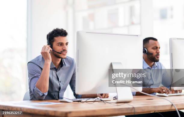 customer support agents using headsets and computers in office environment collaborative setup - job description stock pictures, royalty-free photos & images