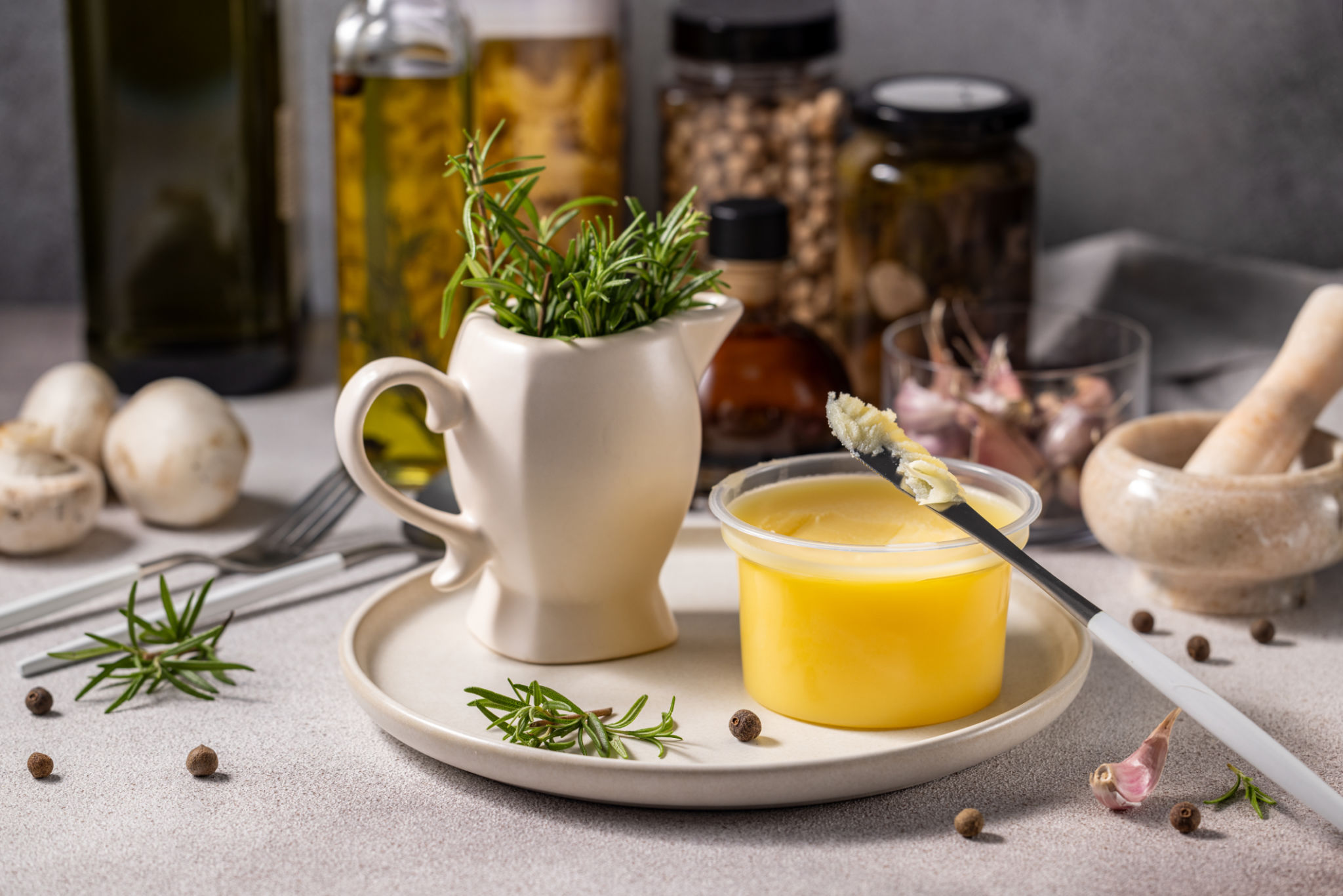 Aromatic ghee butter with rosemary and spices enhancing culinary delights Aromatic ghee butter with rosemary and spices enhancing culinary delights