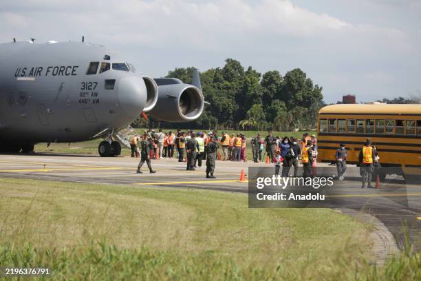 Deported migrants arrive from US in a military plane at Ramon Villeda Morales airport in Cortes, Honduras on January 31, 2025. More than 70 Hondurans...