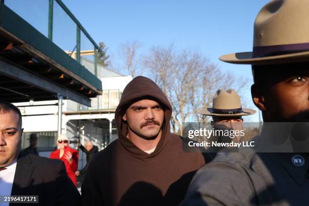 Former NYS Trooper Thomas Mascia in custody outside New York State Police Troop L Headquarters in Farmingdale, New York on January 27, 2025. He is...