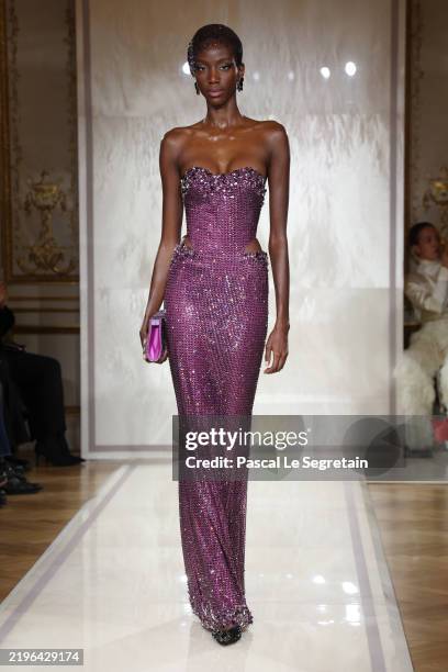 Model walks the runway during the Giorgio Armani Privé Haute Couture Spring-Summer 2025 show as part of Paris Fashion Week on January 28, 2025 in...