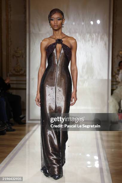 Model walks the runway during the Giorgio Armani Privé Haute Couture Spring-Summer 2025 show as part of Paris Fashion Week on January 28, 2025 in...