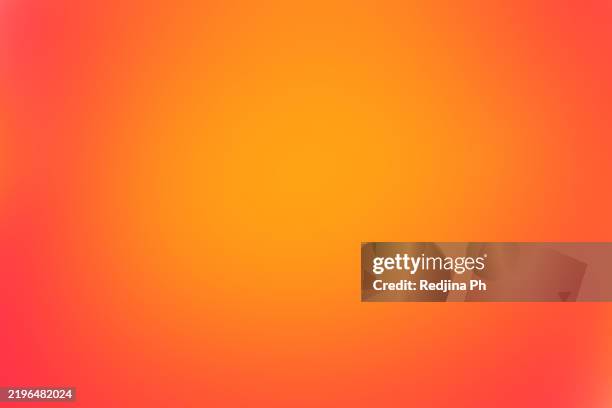 abstract gradient background with vibrant orange and red hues for creative use - sfondo arancione foto e immagini stock