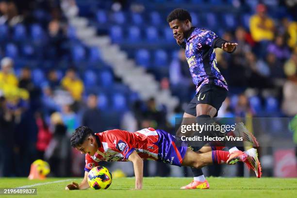 Luis Najera of Atletico San Luis battles for possession with Javairo Dilrosun of America during the 4th round match between America and Atletico San...