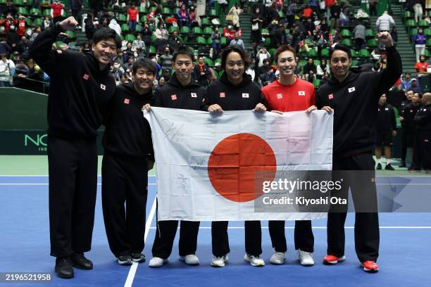 Team Japan Takeru Yuzuki, Yoshihito Nishioka, Kei Nishikori, team captain Go Soeda, Yosuke Watanuki and Yasutaka Uchiyama pose for a photo as they...