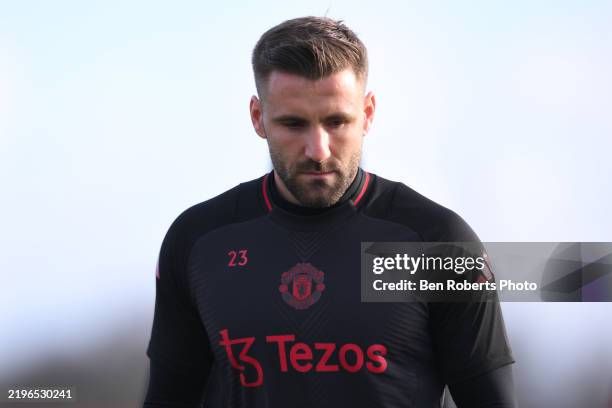Luke Shaw of Manchester United takes part in a UEFA Europa League 2024/25 League Phase MD8 training session at the Carrington Training complex on...