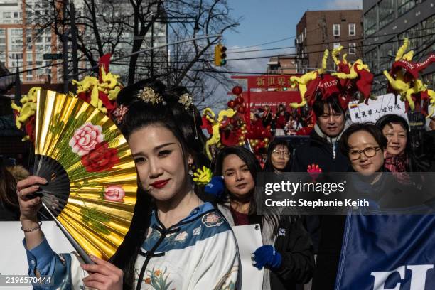 Cheyenne Che participates in a parade celebrating the Lunar New Year in the Flushing neighborhood on February 1, 2025 in the Queens borough of New...