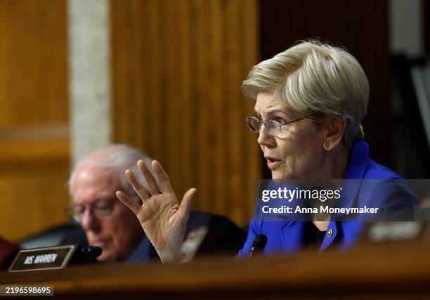 Senate Finance Committee member Sen. Elizabeth Warren questions Robert F. Kennedy Jr., U.S. President Donald Trump's nominee for Secretary of Health...