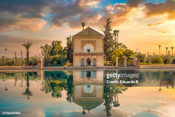 sunset landscape with reflection in the water in marrakech - marrakech stockfoto's en -beelden